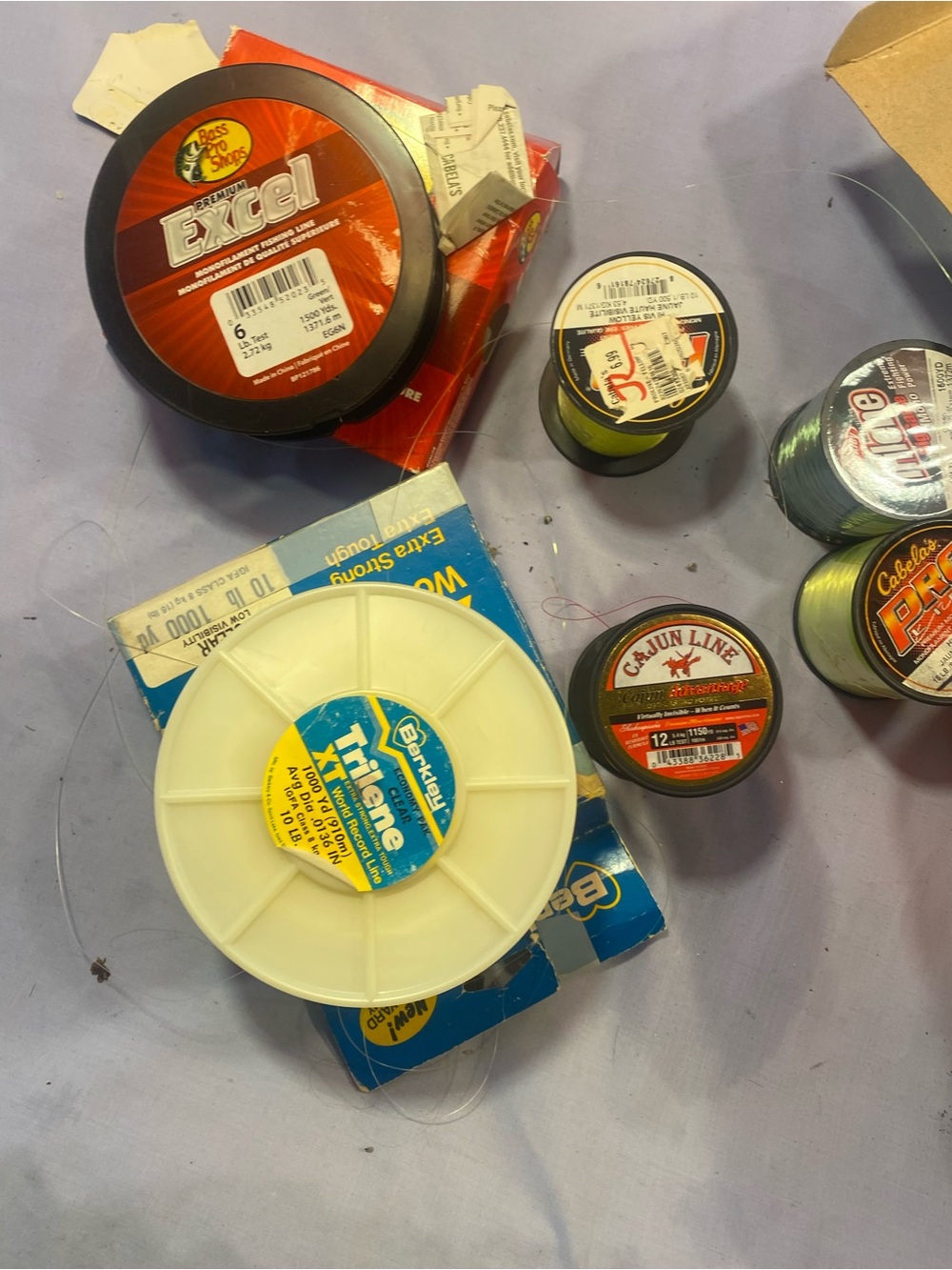 Cabela's Fishing Line Spools in Yellow, Black, Red, White, Green